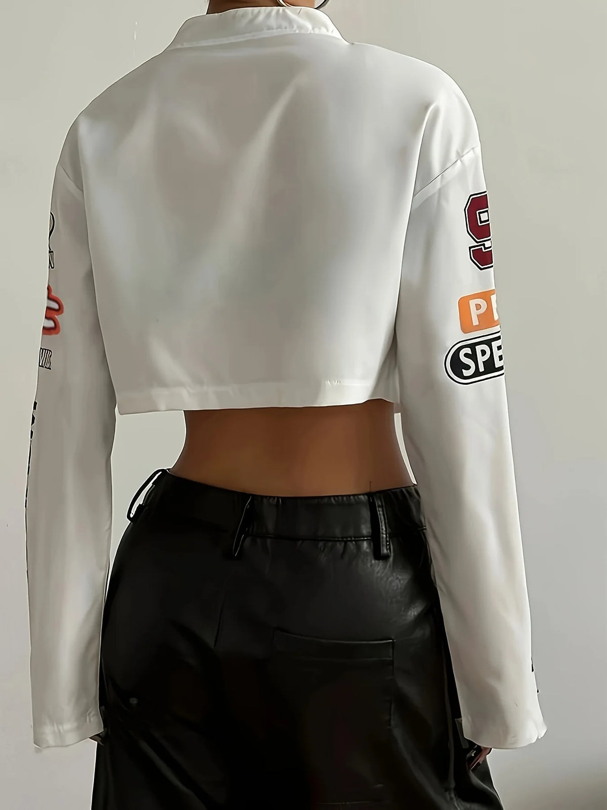 Y2K White Cropped "WHAT'S UP" Graphic Racing Jacket - Moto Biker Bomber with Sleeve Patches - Women’s High-Waist Streetwear Leather Coat